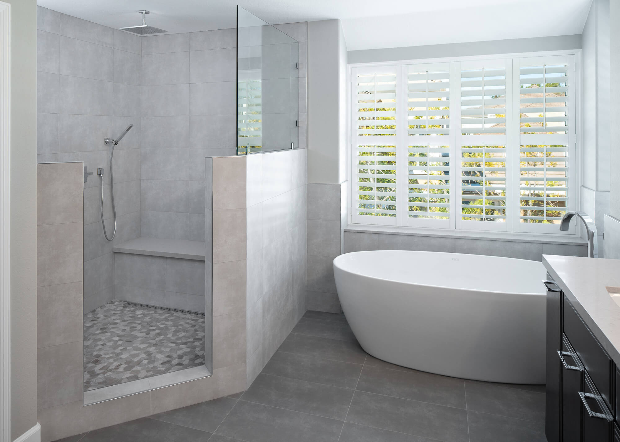 Bathroom with walk-in shower and bathtub
