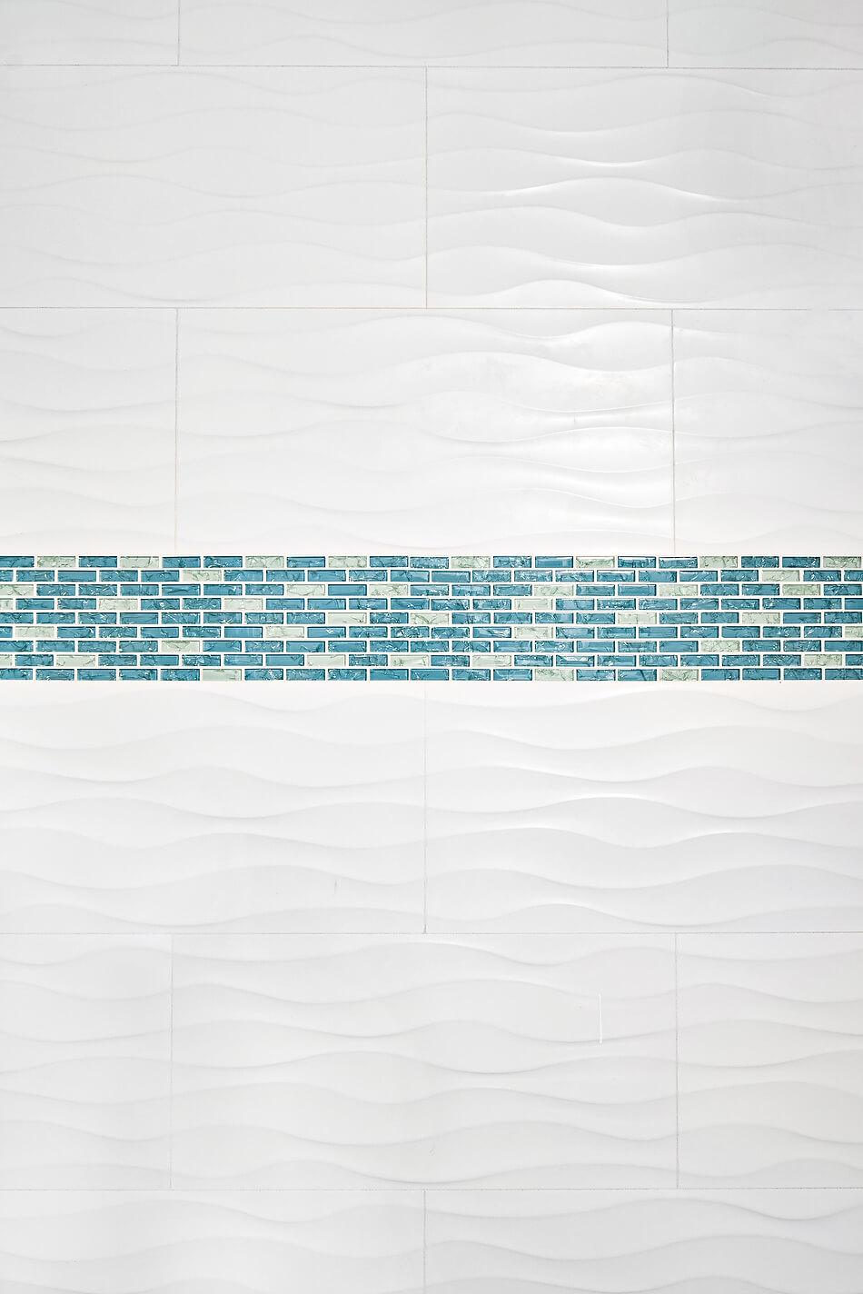 Capistrano Beach bathroom remodel with beach themed shower tile design