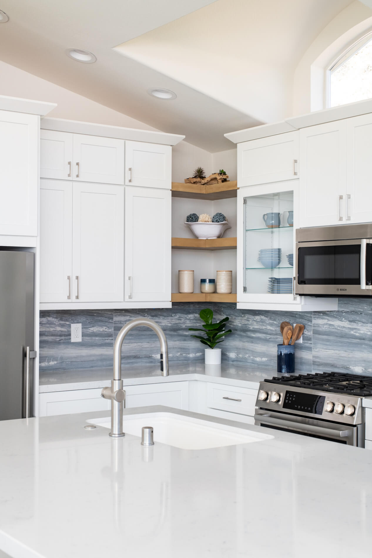 Kitchen-island-remodel-with-sink-allows-more-inclusive-prepping-space
