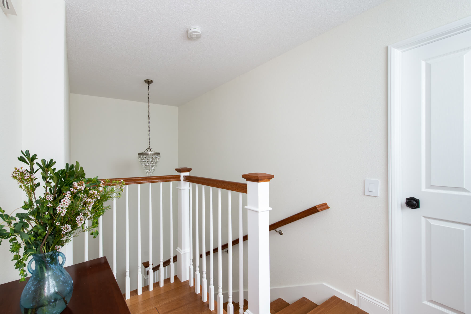 New-opened-landing-above-stairway-design-in-home-renovation