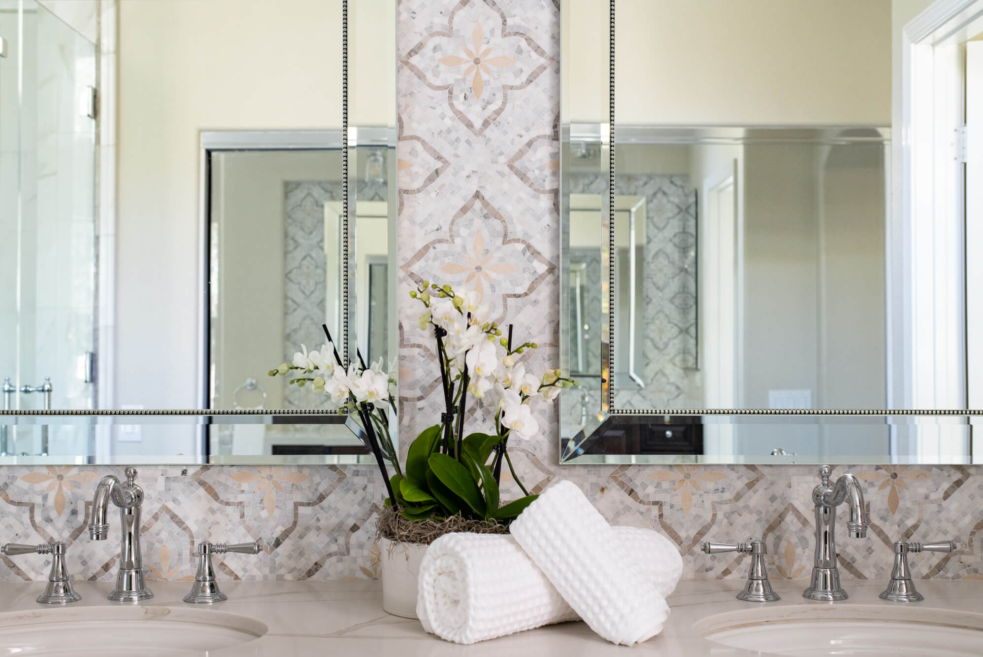marble-mosaic-backsplash-in-bathroom-remodel