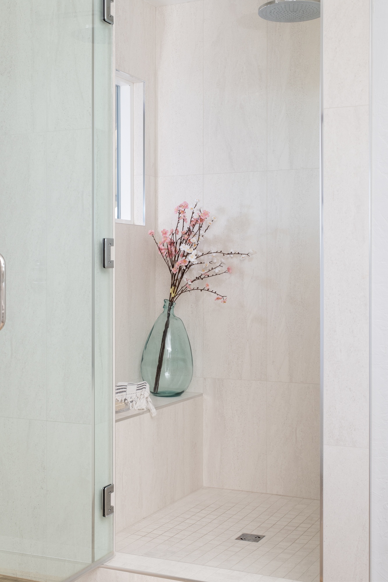 master-shower-remodel-with-shower-bench-and-porcelain-tiles