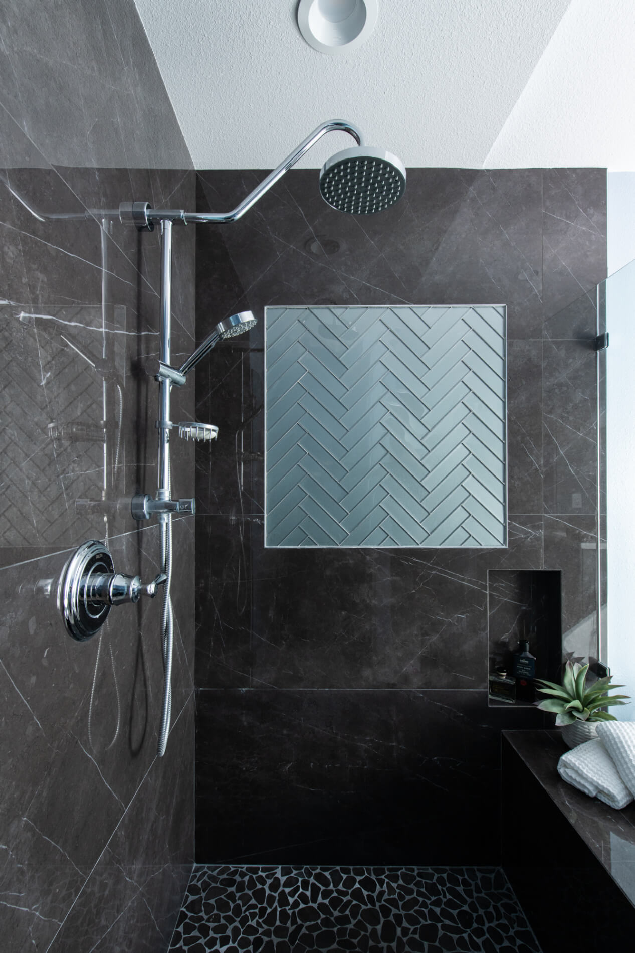 Dark-porcelain-shower-wall-tile-in-bathroom-remodel