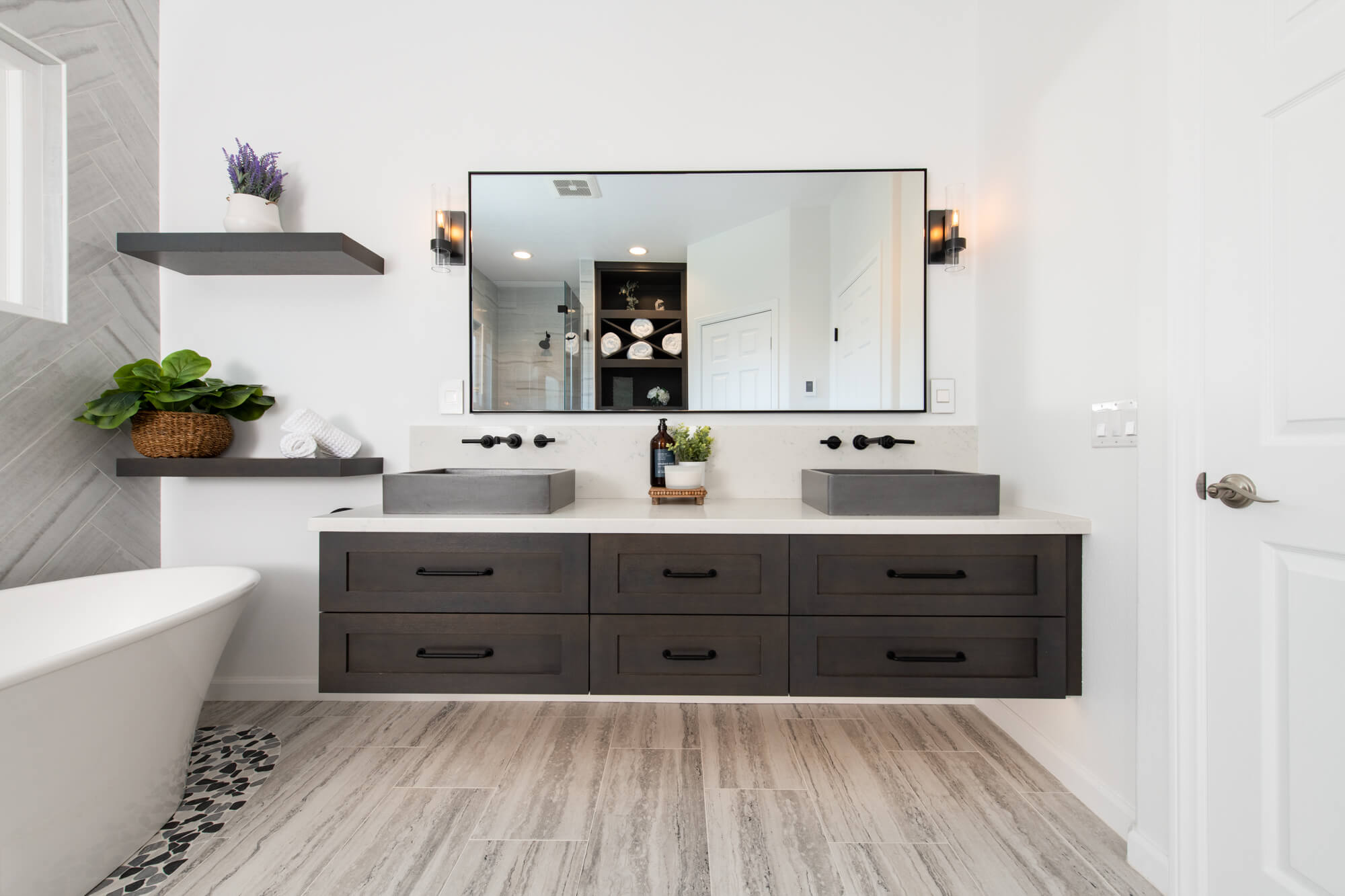 https://www.seapointe.com/wp-content/uploads/2021/05/Floating-bathroom-vanity-remodel-with-undercabinet-lighting.jpg