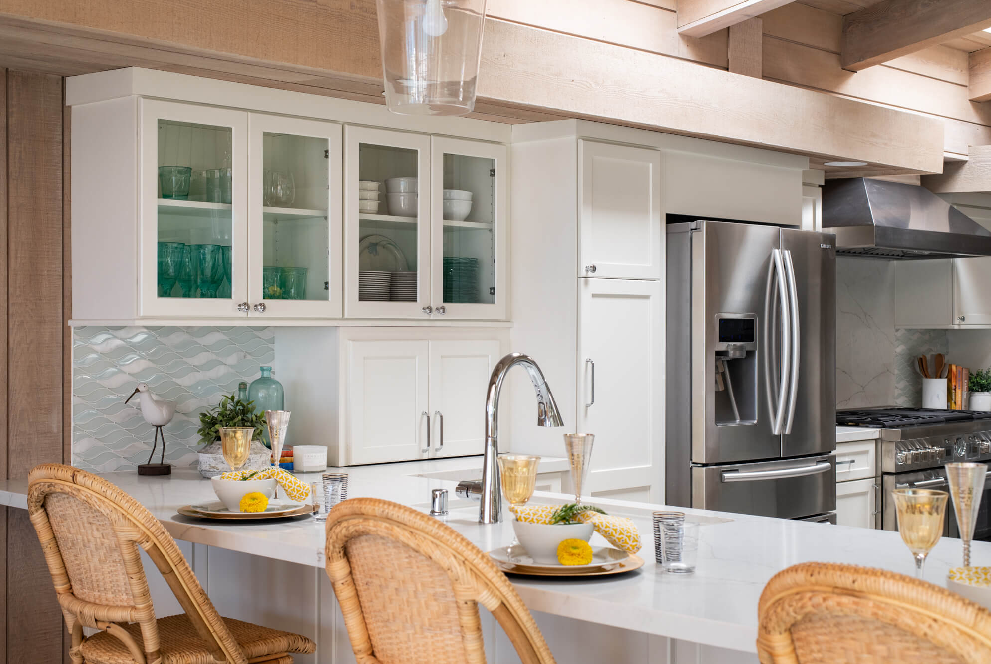 White cabinets with glass doors in San Clemente kitchen remodel