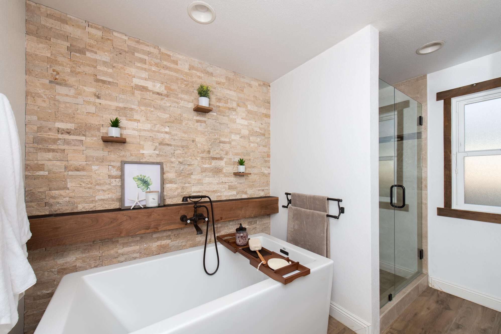 Rustic master bathroom remodel with shower and tub