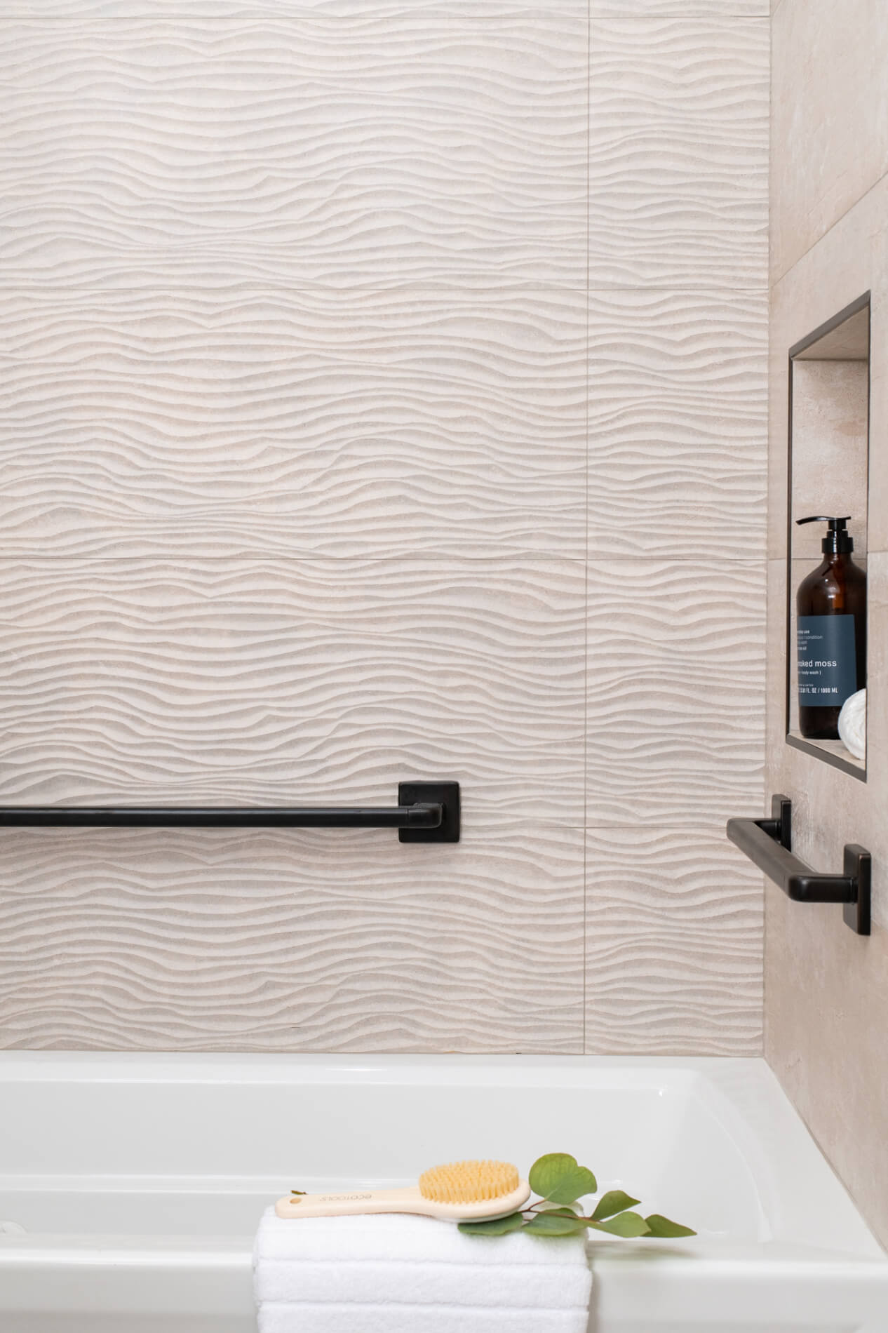 Textured porcelain shower tile in bathroom remodel