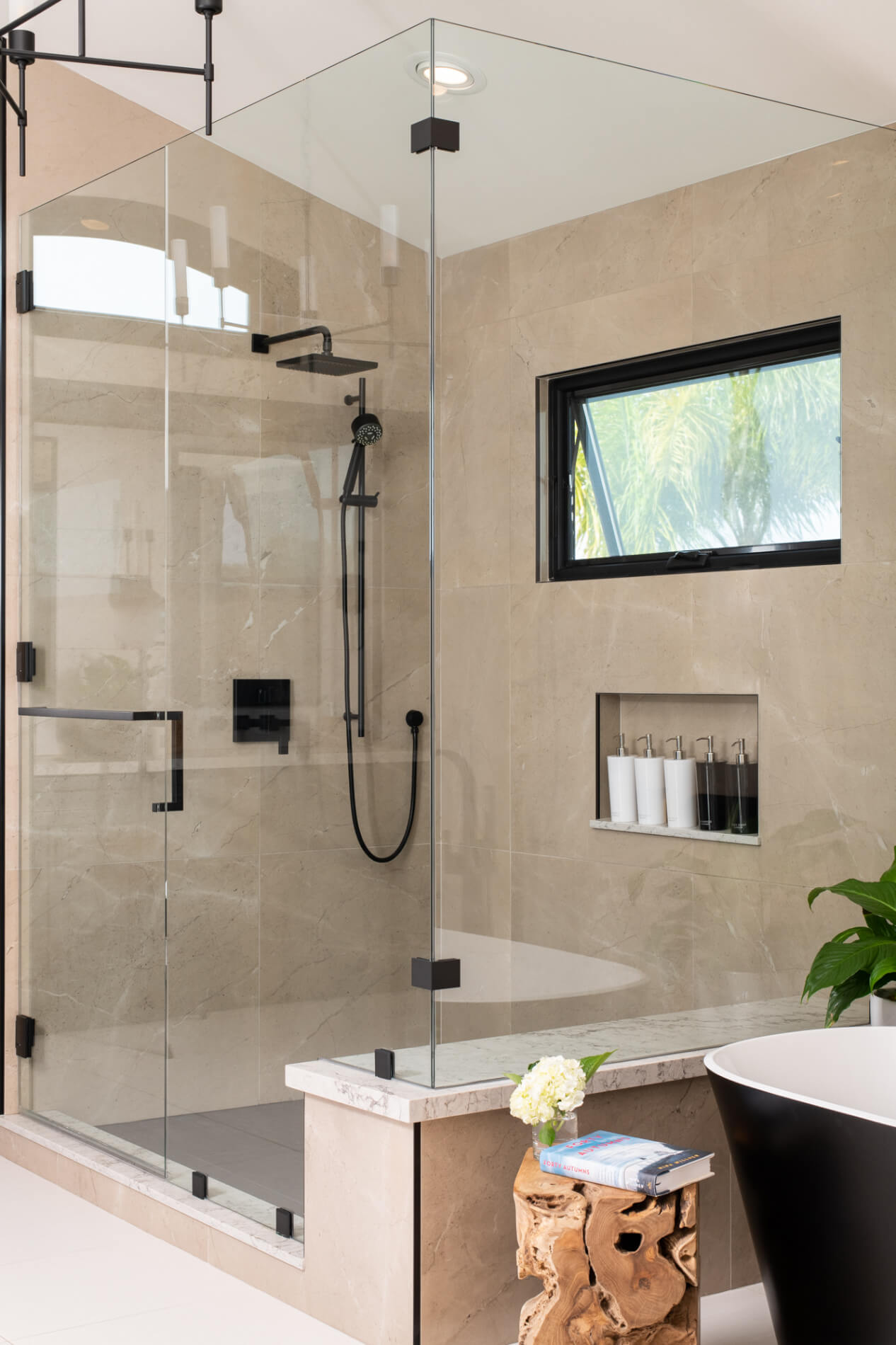 Dark-porcelain-shower-wall-tile-in-bathroom-remodel