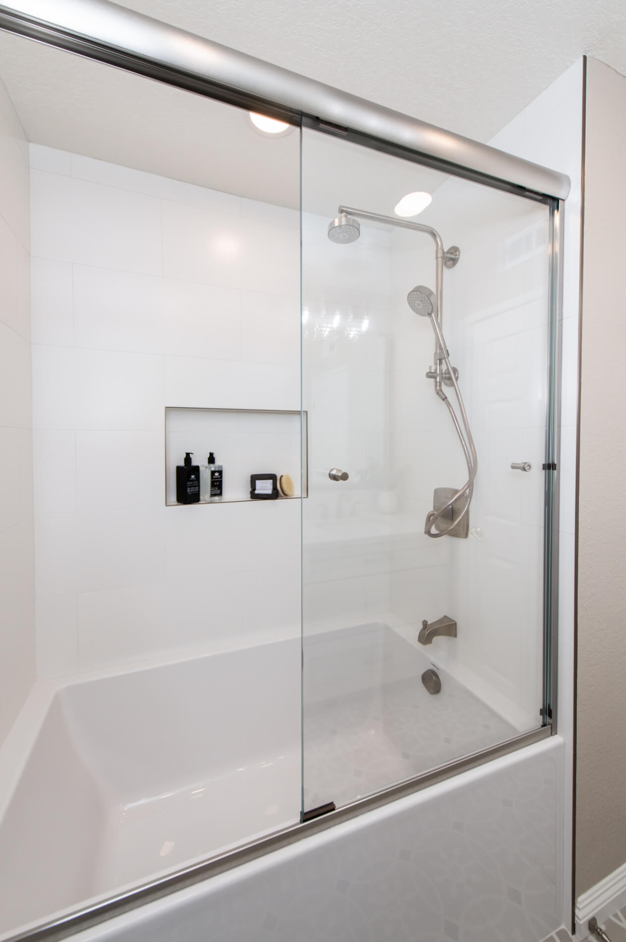 Dark-porcelain-shower-wall-tile-in-bathroom-remodel