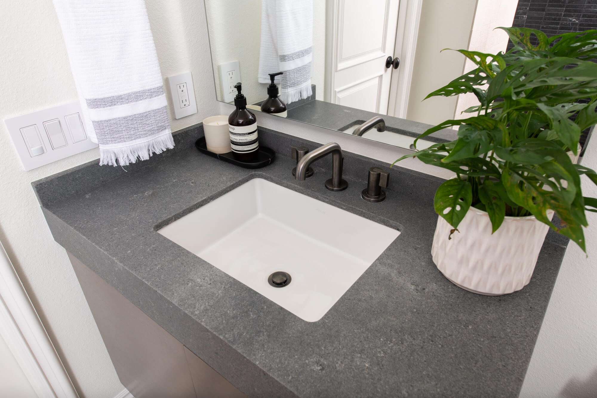 Quartz countertop in guest bathroom remodel