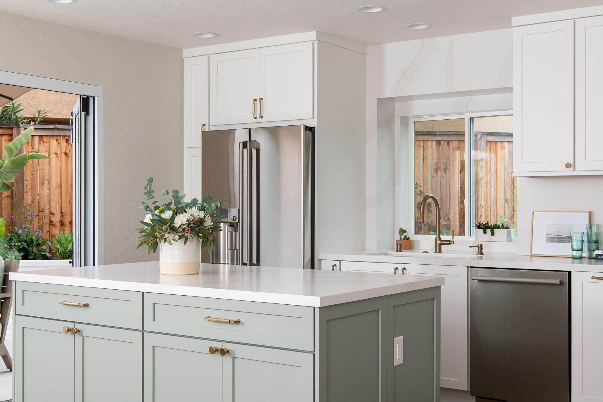 maho-bay-and-white-shaker-cabinets-white-quartz-countertops