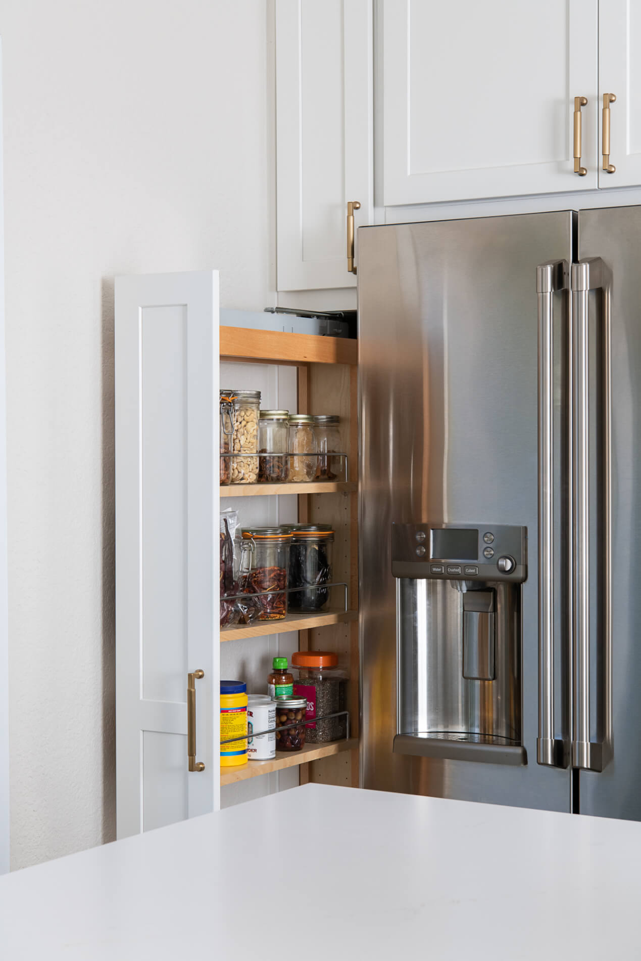 Pullout Pantry Cabinet - Omega Cabinetry Specialty Cabinets