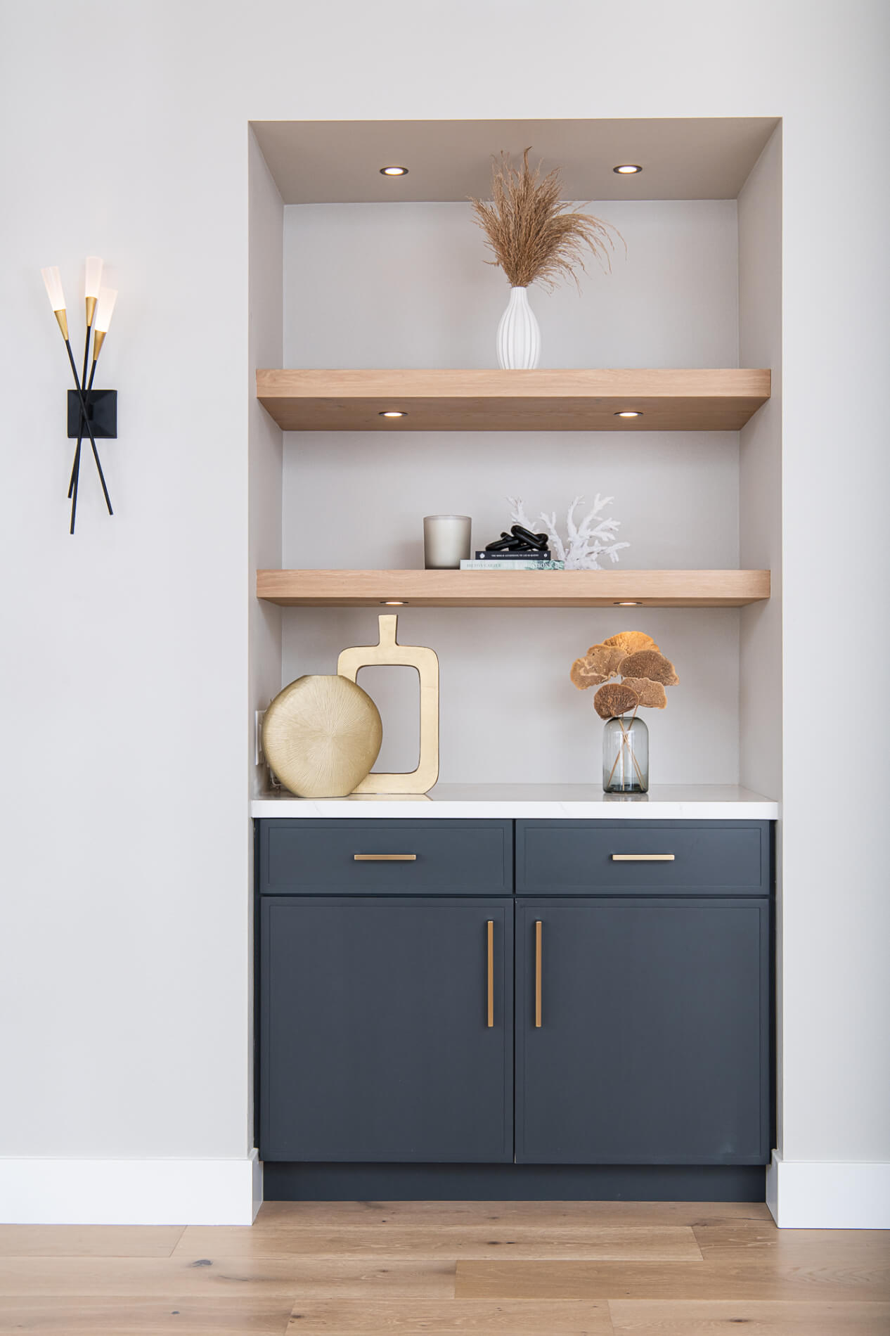 custom-nook-floating-shelves-puck-lights-quartz-countertop