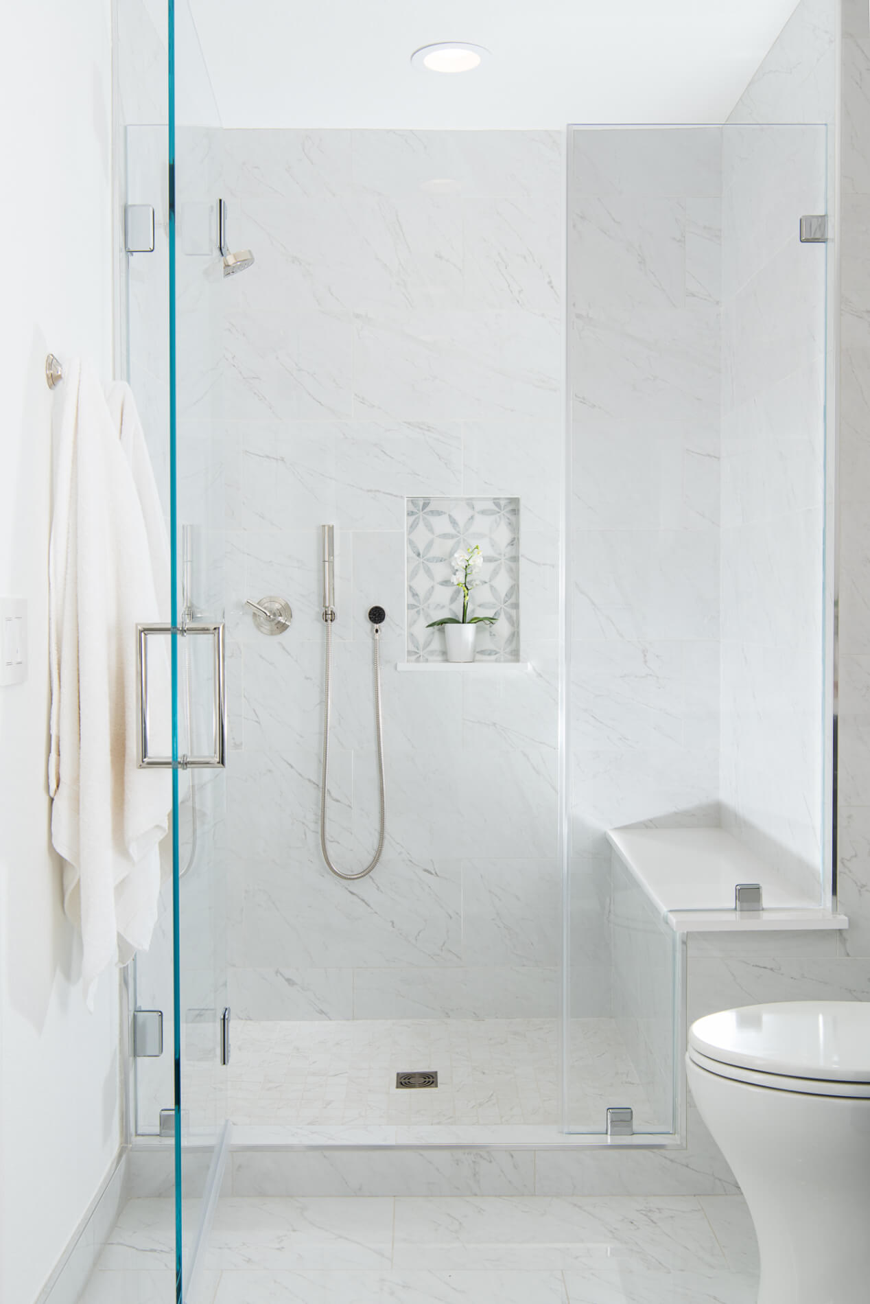 custom-glass-shower-enclosure-with-through-the-glass-polished-chrome-handle