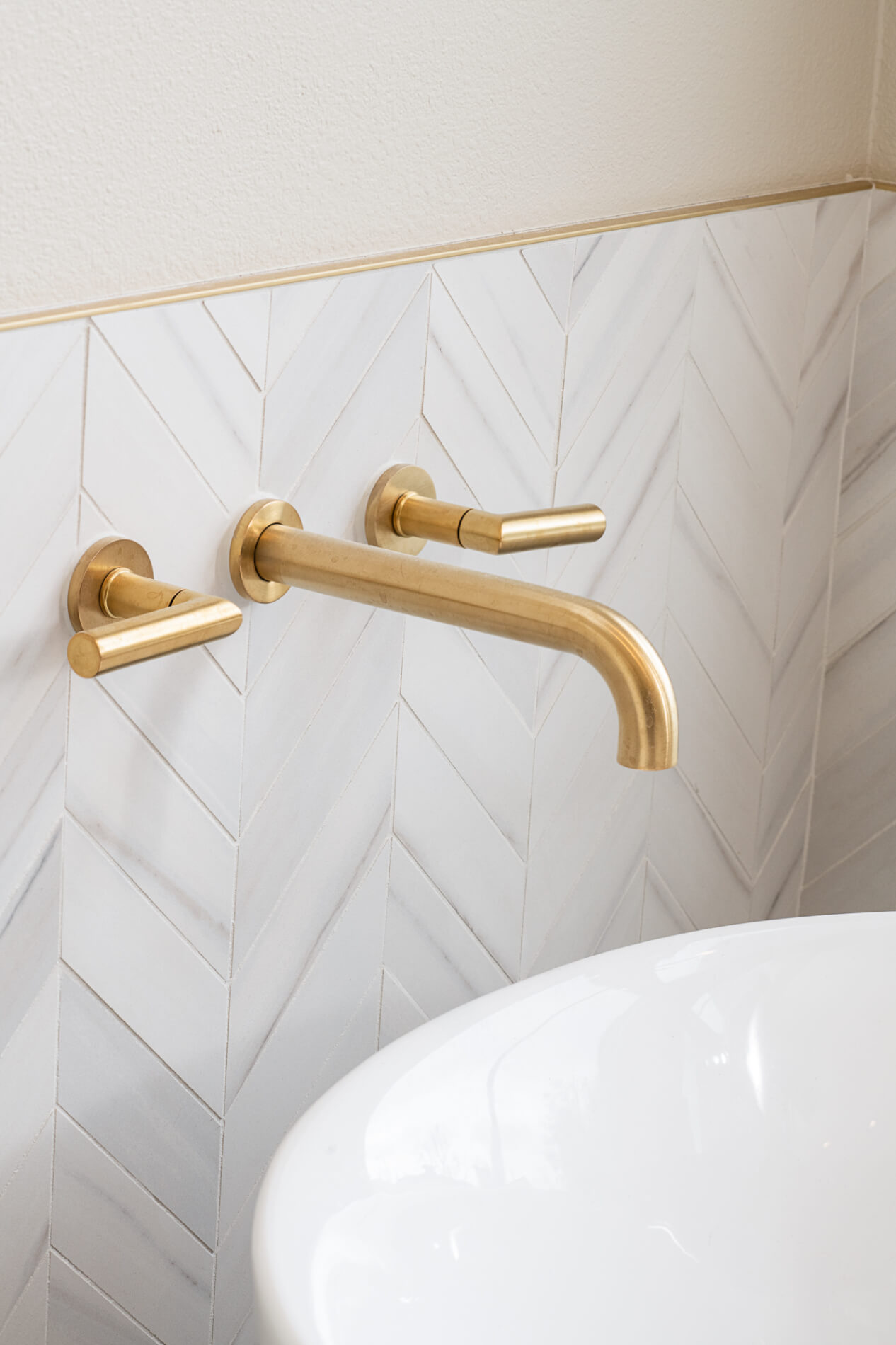 wall-mounted-tub-filler-and-schluter-trim-in-satin-gold