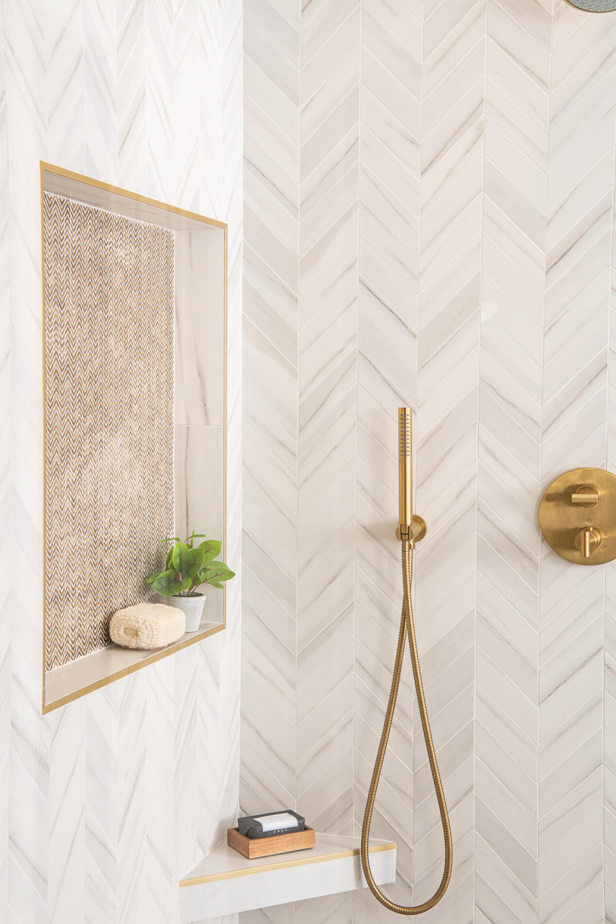 shower-corner-shelf-with-satin-gold-schluter-trim