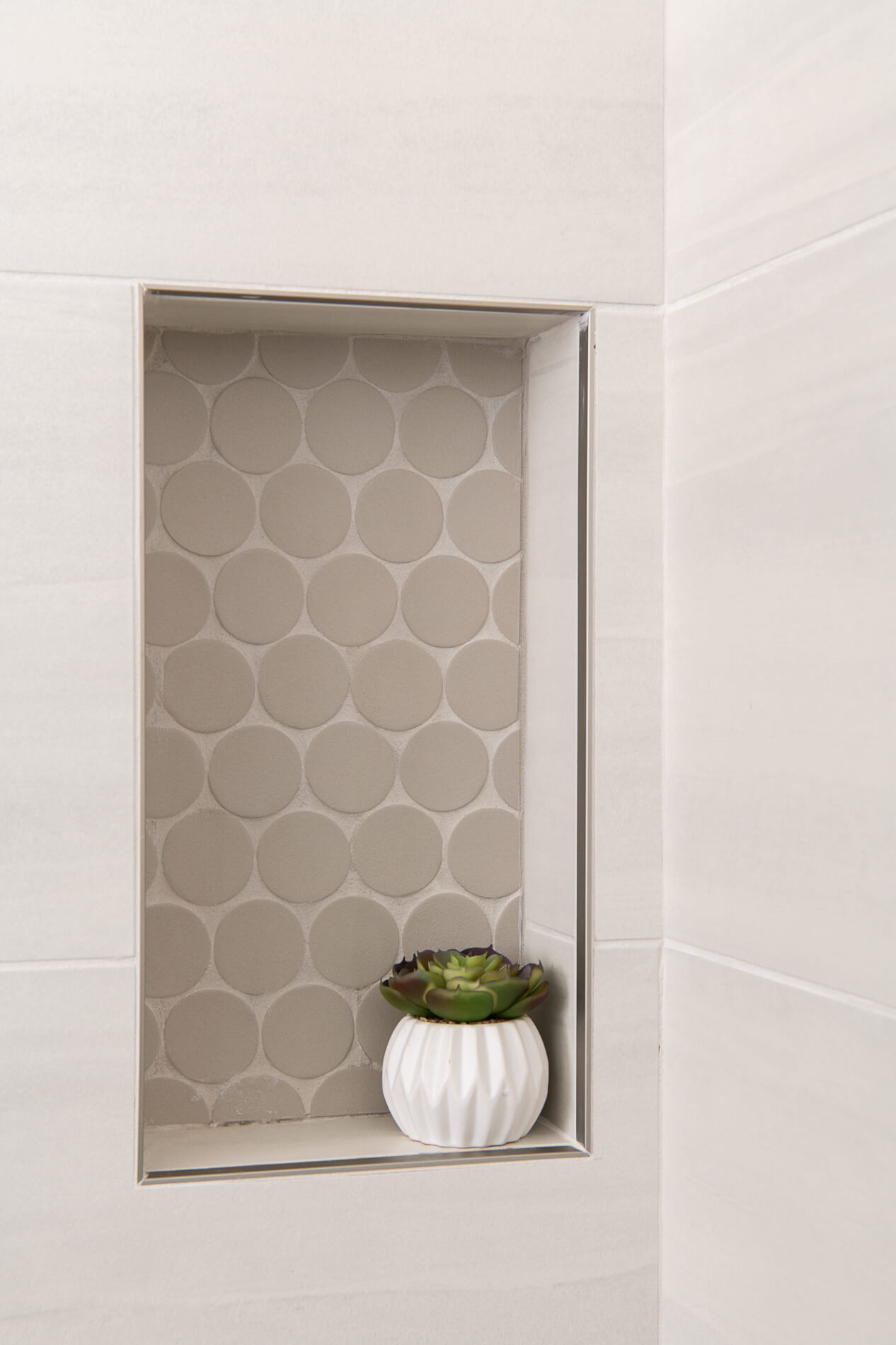 shower-featuring-2-shampoo-niches-in-kumo-gray-2-inch-round-mosaic