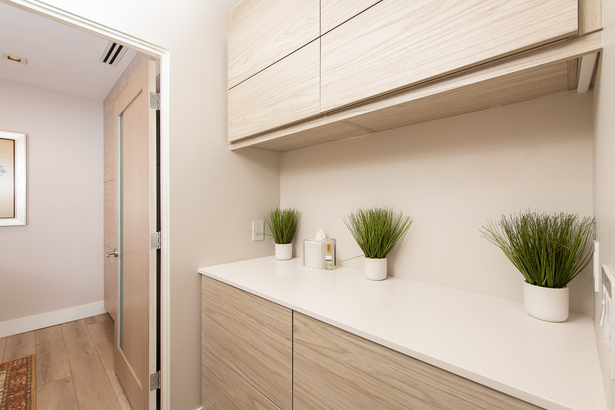 20-custom-kitchen-craft-hallway-cabinets-Summit-Acrylic-Wood-Wired-Mercury-finish-Corterra-solid-surface-whitequartz-countertop