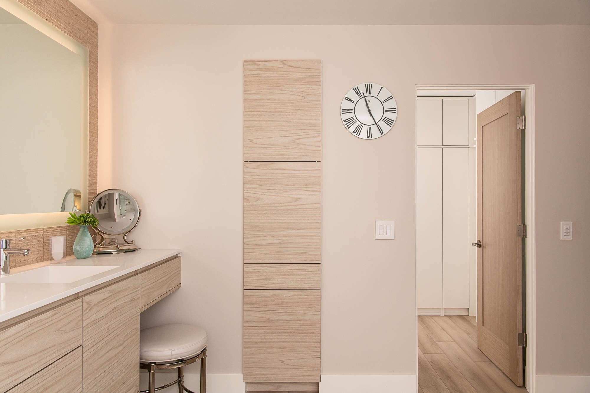 27-Omega-Pinnacle-double-vanity-and-in-wall-linen-cabinet-laminate-wood-in-lake-house-finish