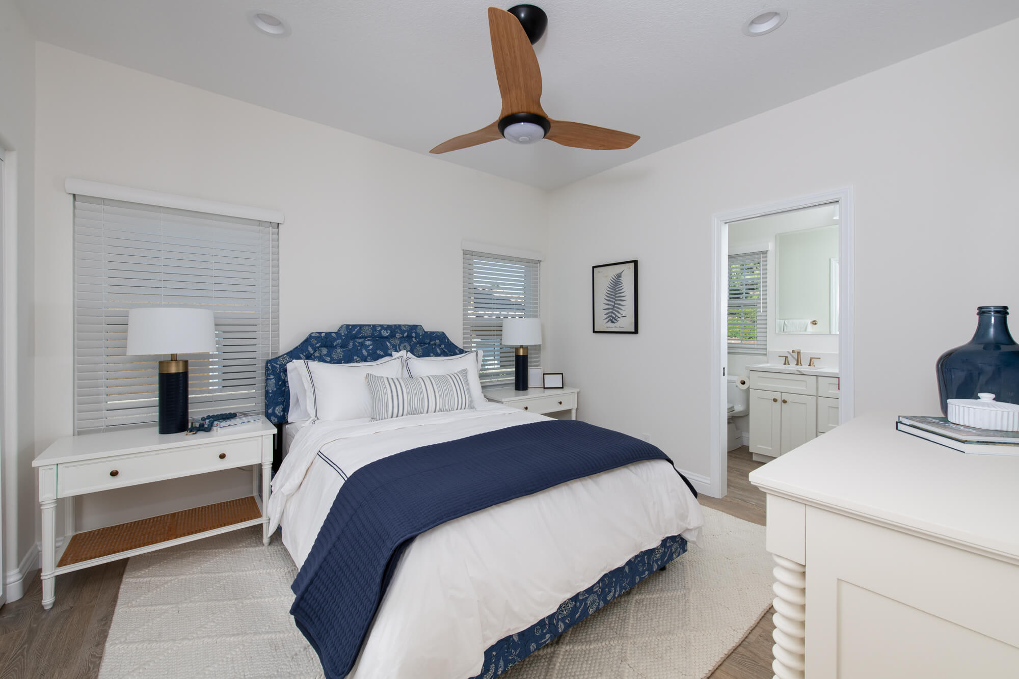 Elysium-Orto-Botanico-Beige-porcelain-tile-flooring-New-paint-baseboards-pocket-door-LED-can-lights-and-ceiling-fan