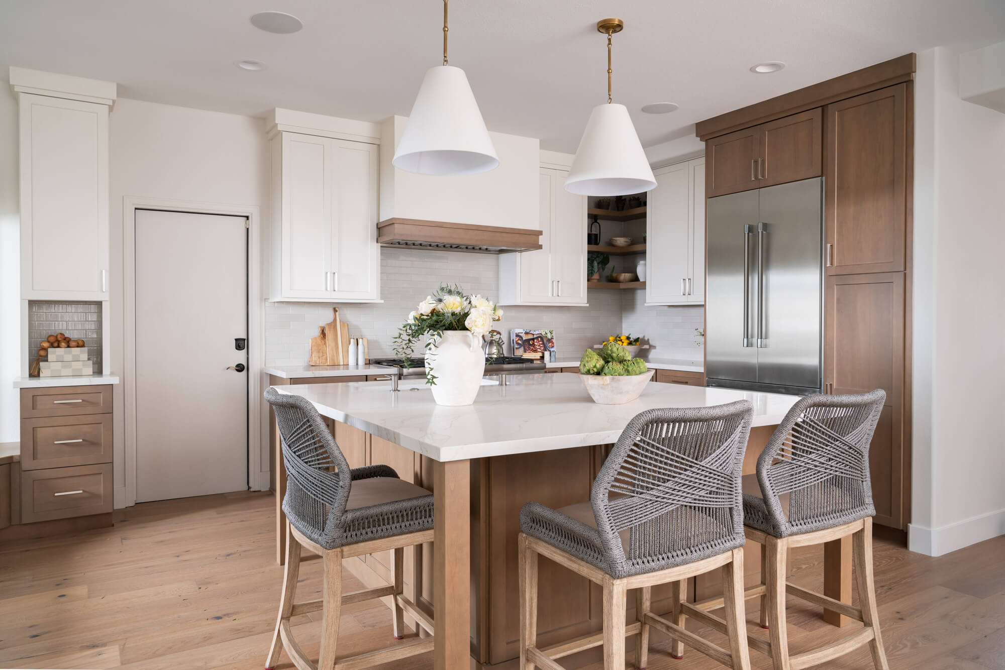 upper-cabinetry-framed-in-Omega-Dynasty-Alderwood-in-Elemental-White-blair-style-shaker-doors