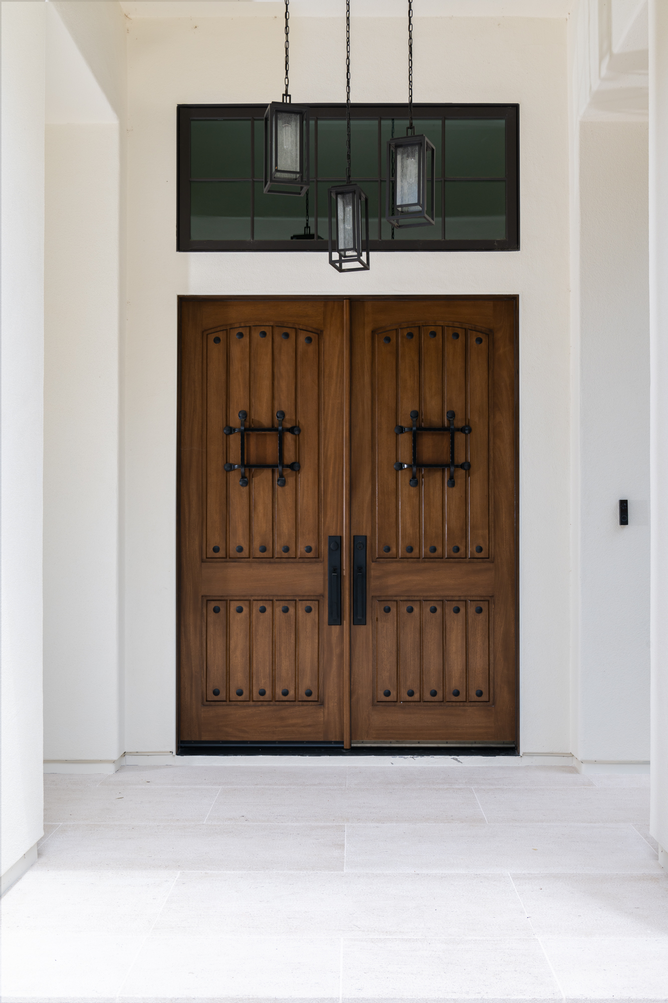 Urban-Doors-Dual-Entry-Doors-in-Knotty-Alder-with-Speakeasy-and-Decorative-Grill-Knocker