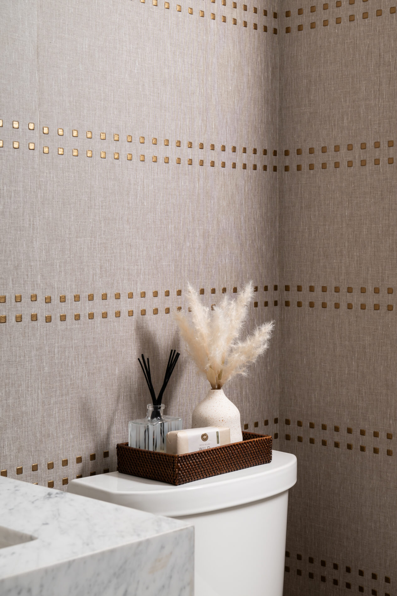 Studs-and-stripes-handcrafted-textured-wallpaper-vertical-brass-on-granite-linen