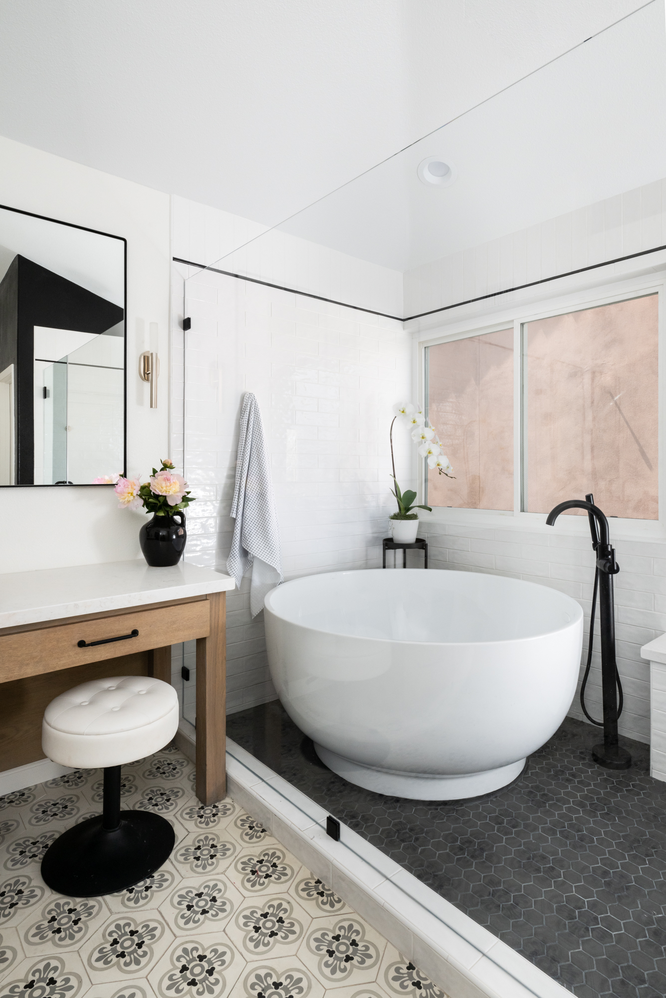 Full-wet-room-with-custom-shower-glass-enclosure-with-through-the-glass-matte-black-handle