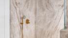 Shower-walls-Quartzite-Slab-Leathered-Taj-Mahal-flooring-Limestone-penny-rounds-oyster-gray-grout