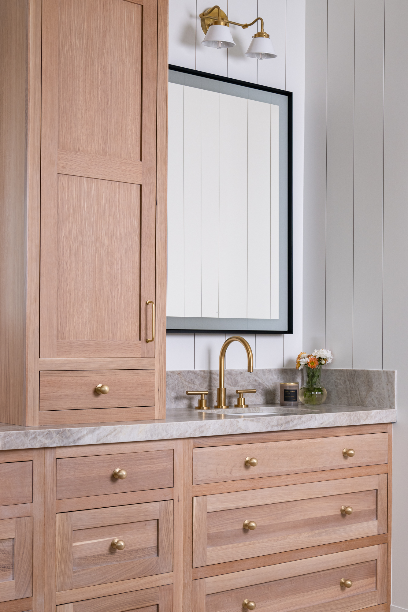 tall-utility-cabinet-separating-the-vanity-sinks