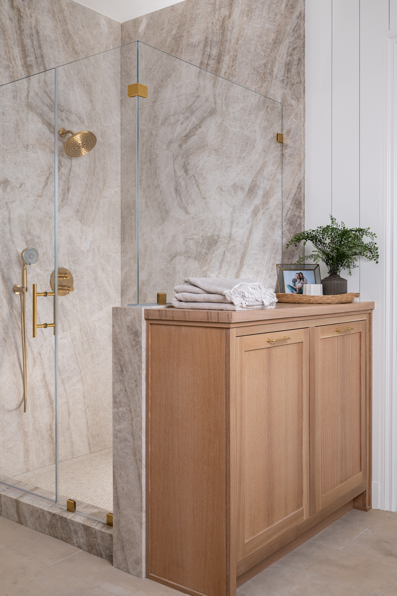 built-in-hamper-with-brass-knobs-and-pulls