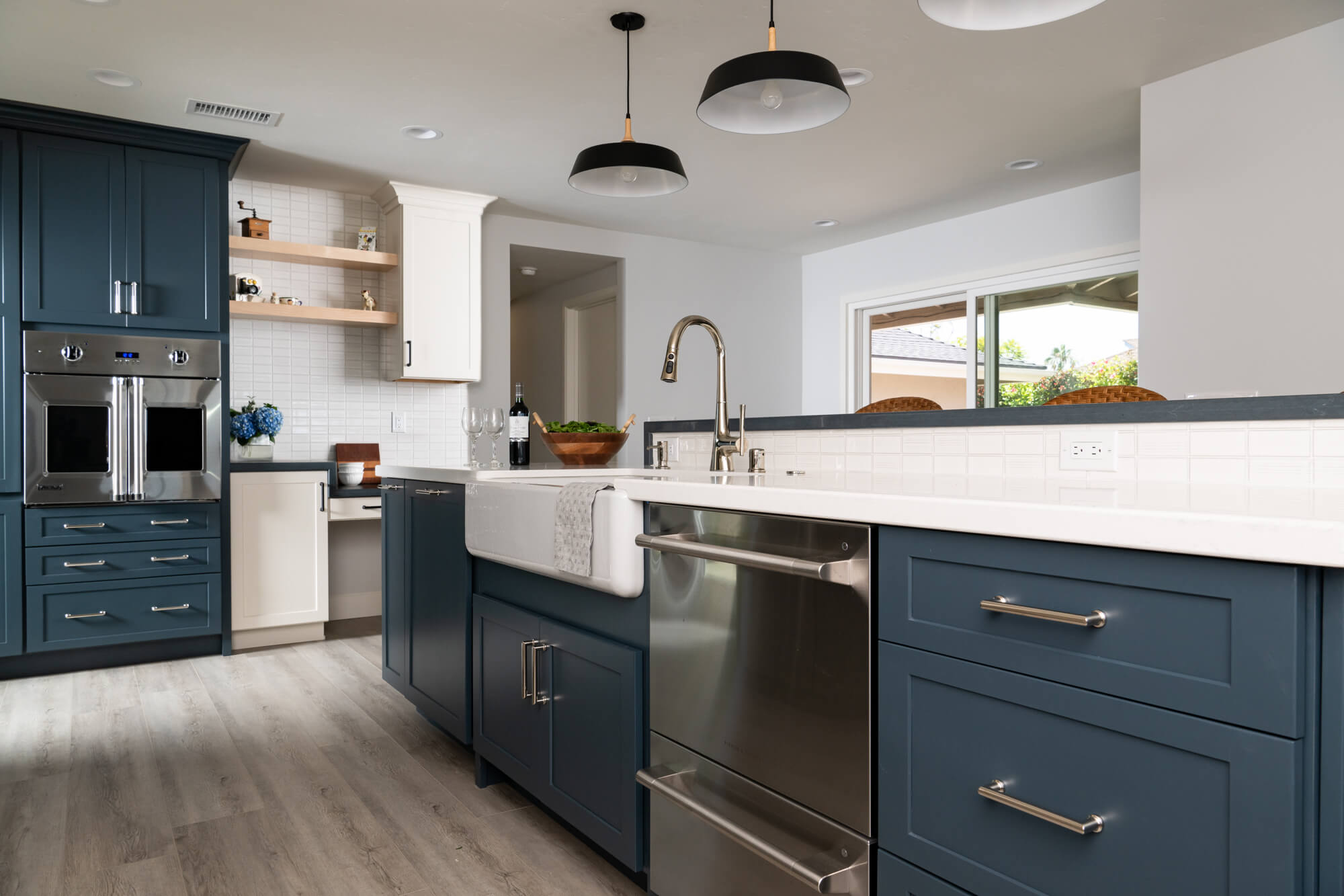 natural-wood-floating-shelves-farmhouse-sink-microwave-drawer-polished-nickel-pulls