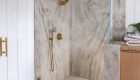 custom-shower-glass-enclosure-with-through-the-glass-ladder-handle-in-Satin-Brass