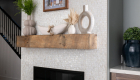 Fire-wall-tile-by-Elysium-in-natural-white-Mother-Of-Pearl-hexagon-tiles-with-Emser-porcelain-tile-hearth-in-color-Hall