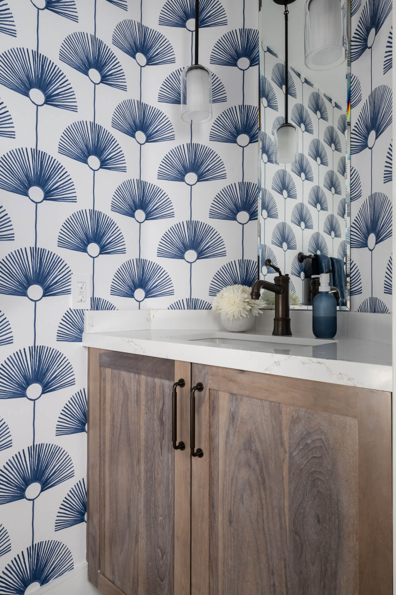 Omega-full-access-cabinetry-made-of-Walnut-in-Ceruse-Natural-finish-with-oil-rubbed-bronze-pulls