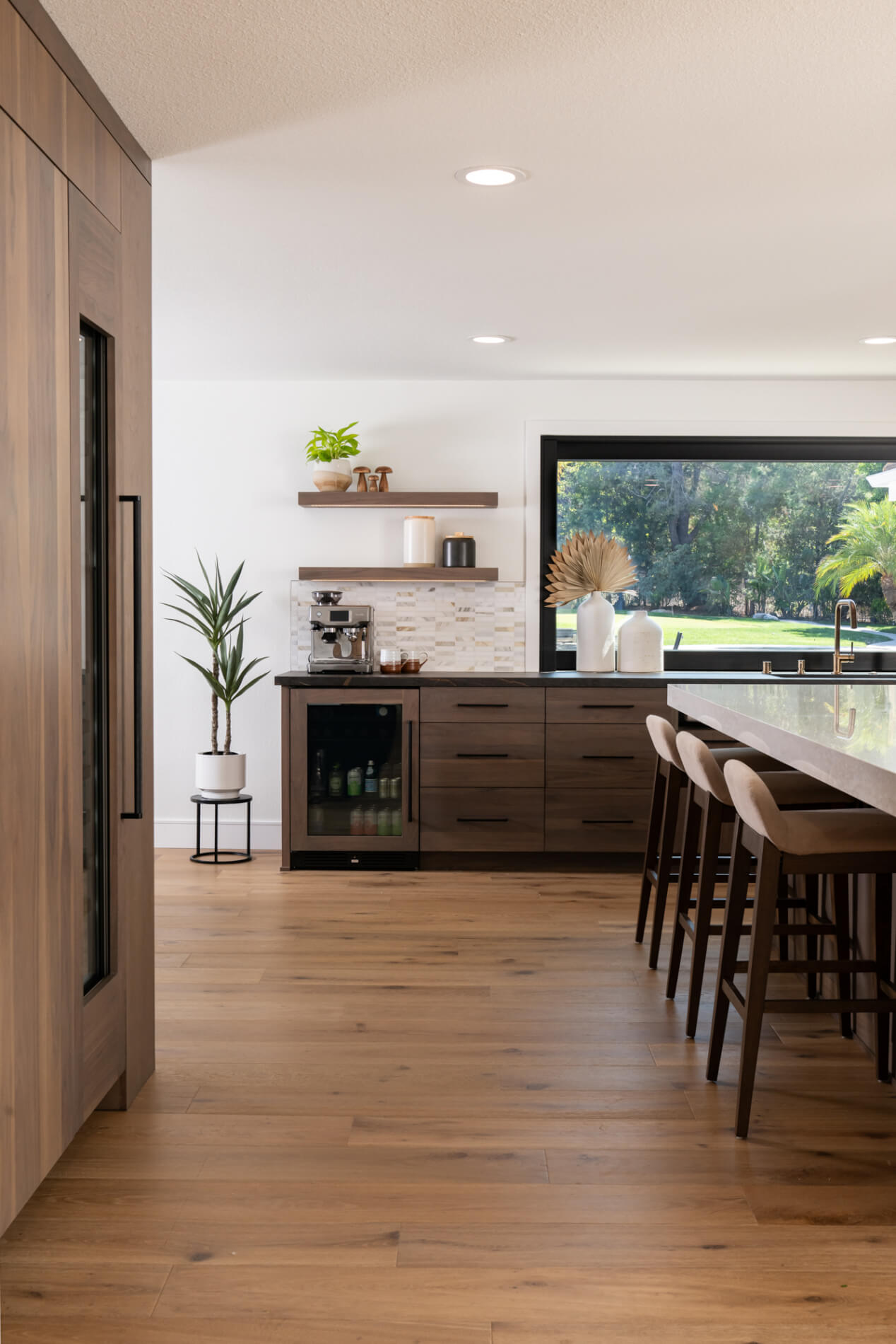 2-wing-walls-were-removed-to-open-up-kitchen-floating-shelves-added-for-decorative-touch-and-under-counter-beverage-frige-at-coffee-bar