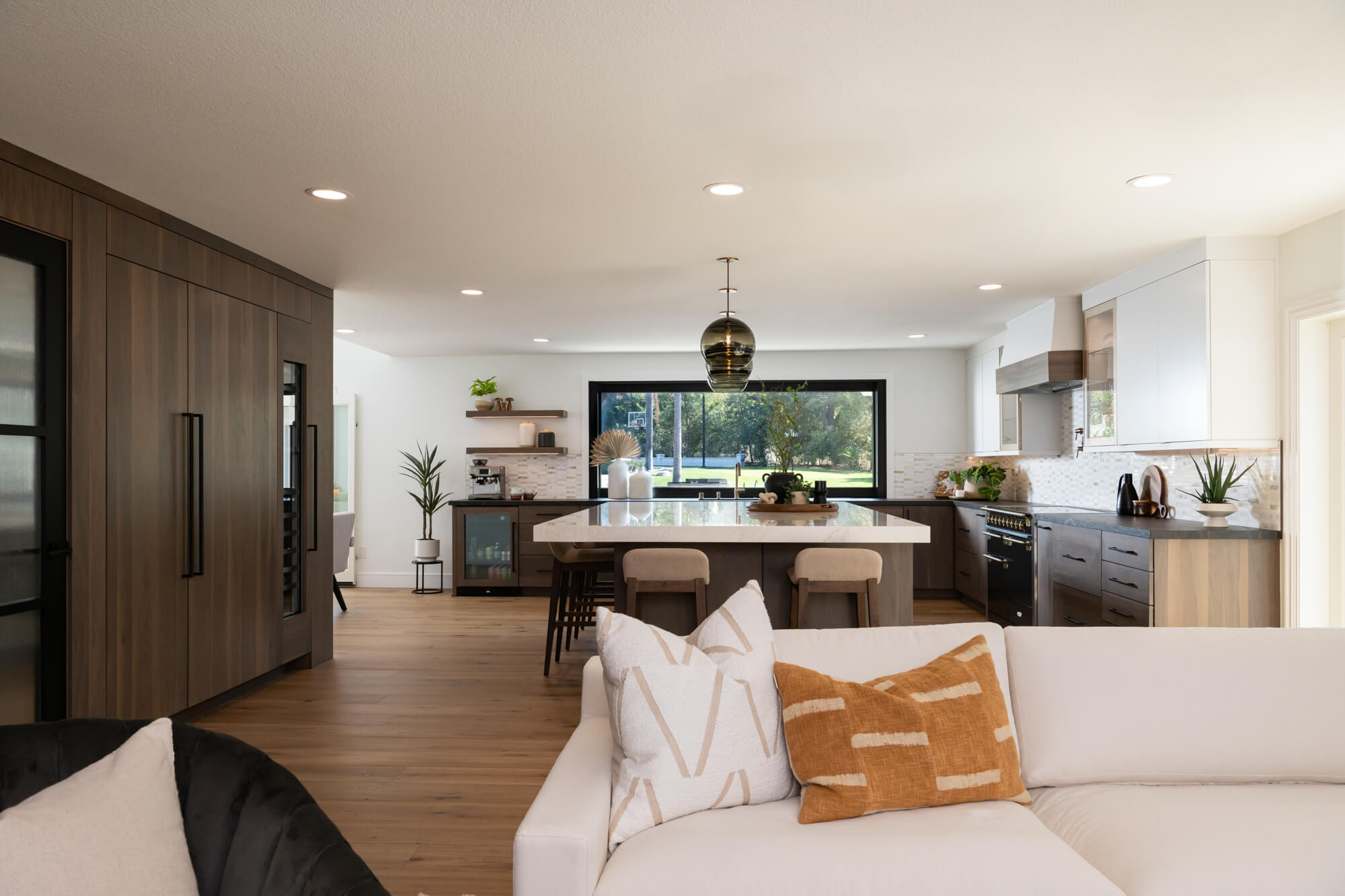 all-new-recessed-lighting-dimmers-LED-strip-lighting-on-upper-glass-doors-and-under-floating-shelves