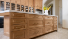 Maple-island-cabinetry-by-Waypoint-in-Rye-finish-with-honey-bronze-pulls