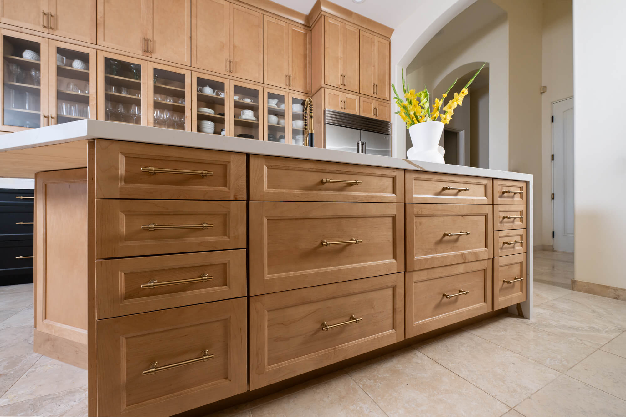 Maple-island-cabinetry-by-Waypoint-in-Rye-finish-with-honey-bronze-pulls