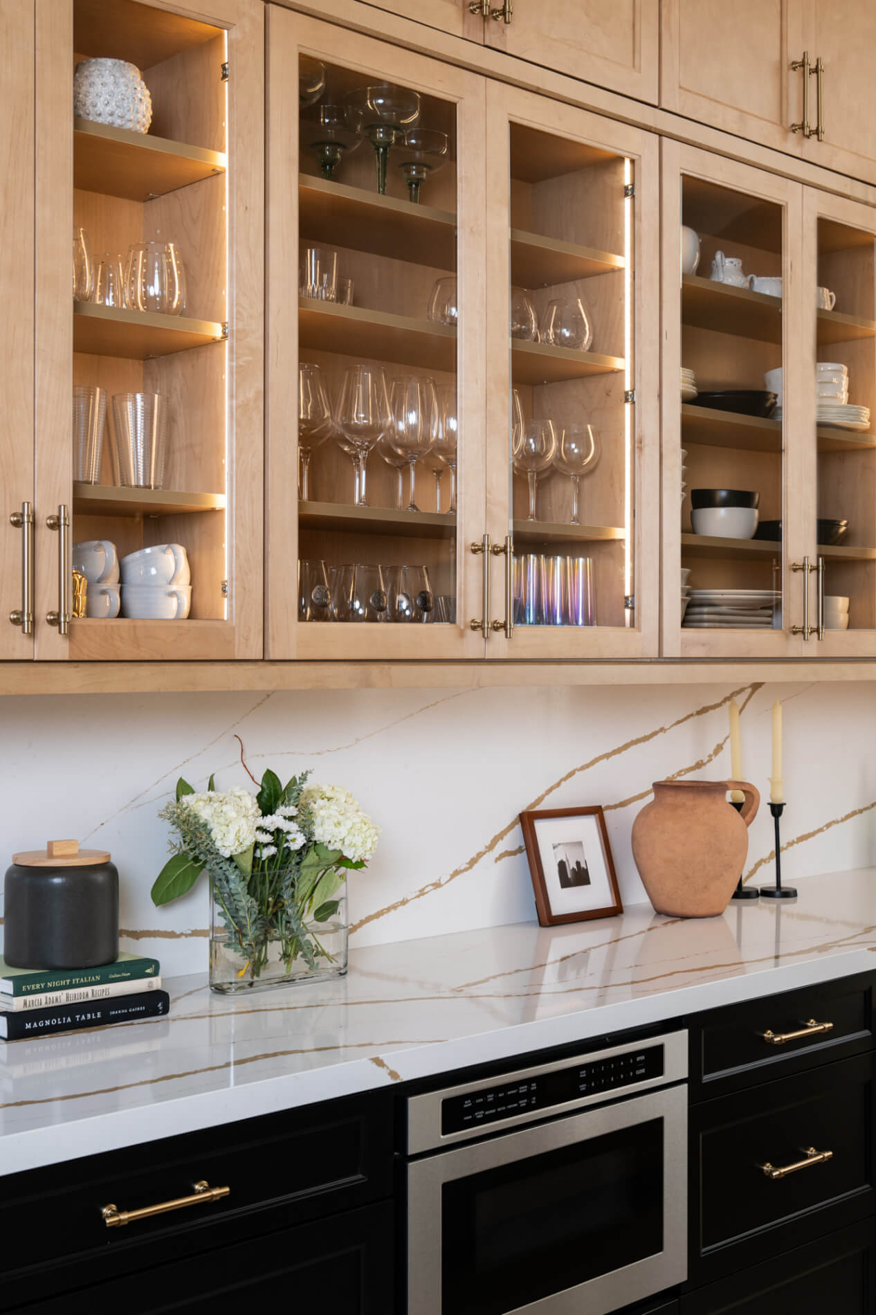 lower-cabinets-by-Waypoint-in-maple-wood-painted-black-with-honey-bronze-pulls