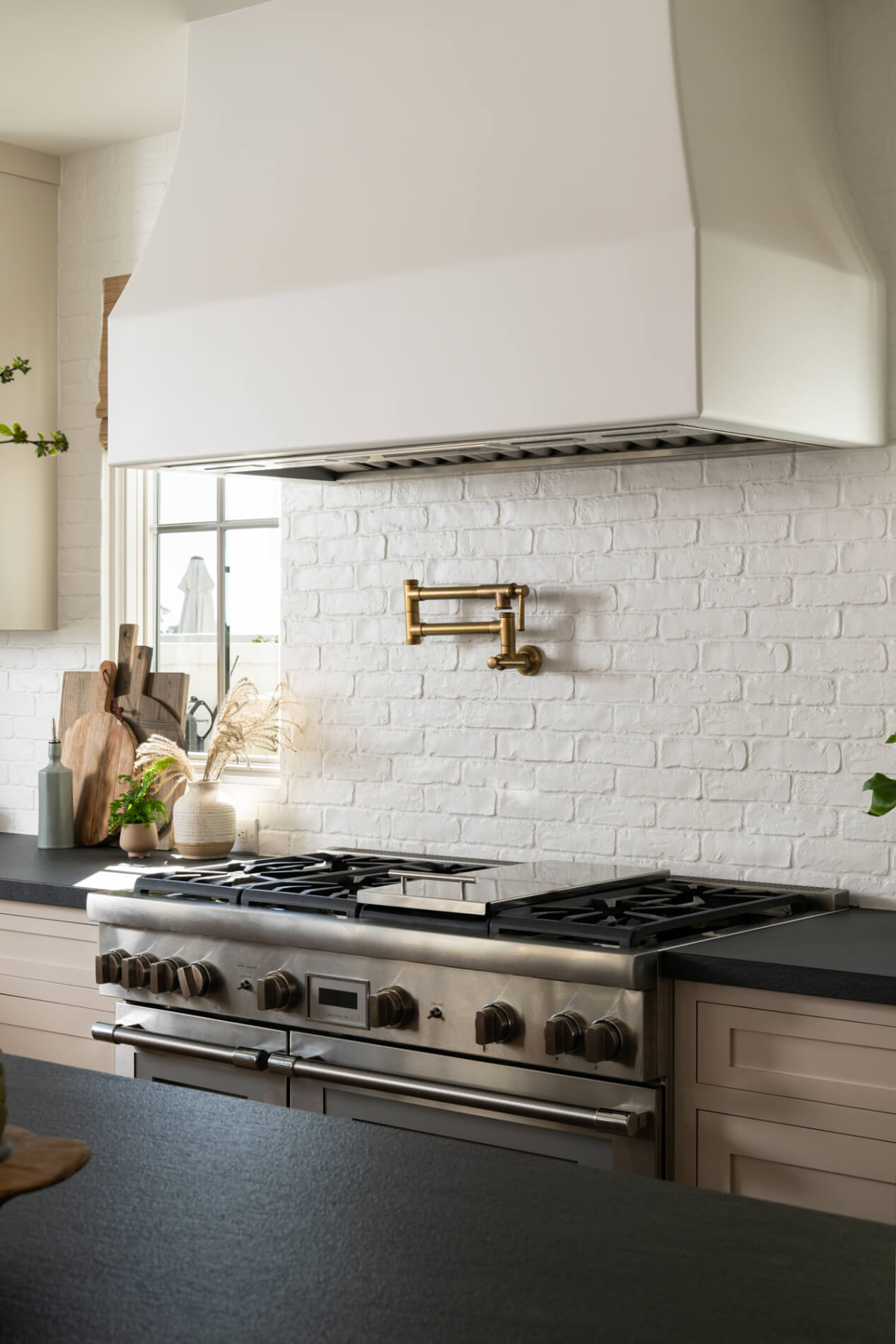 brushed-brass-pot-filler-over-range