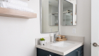 Silestone-quartz-countertops-in-polished-Desert-Silver-finish-white-undermount-sink-polished-chrome-single-handle-faucet