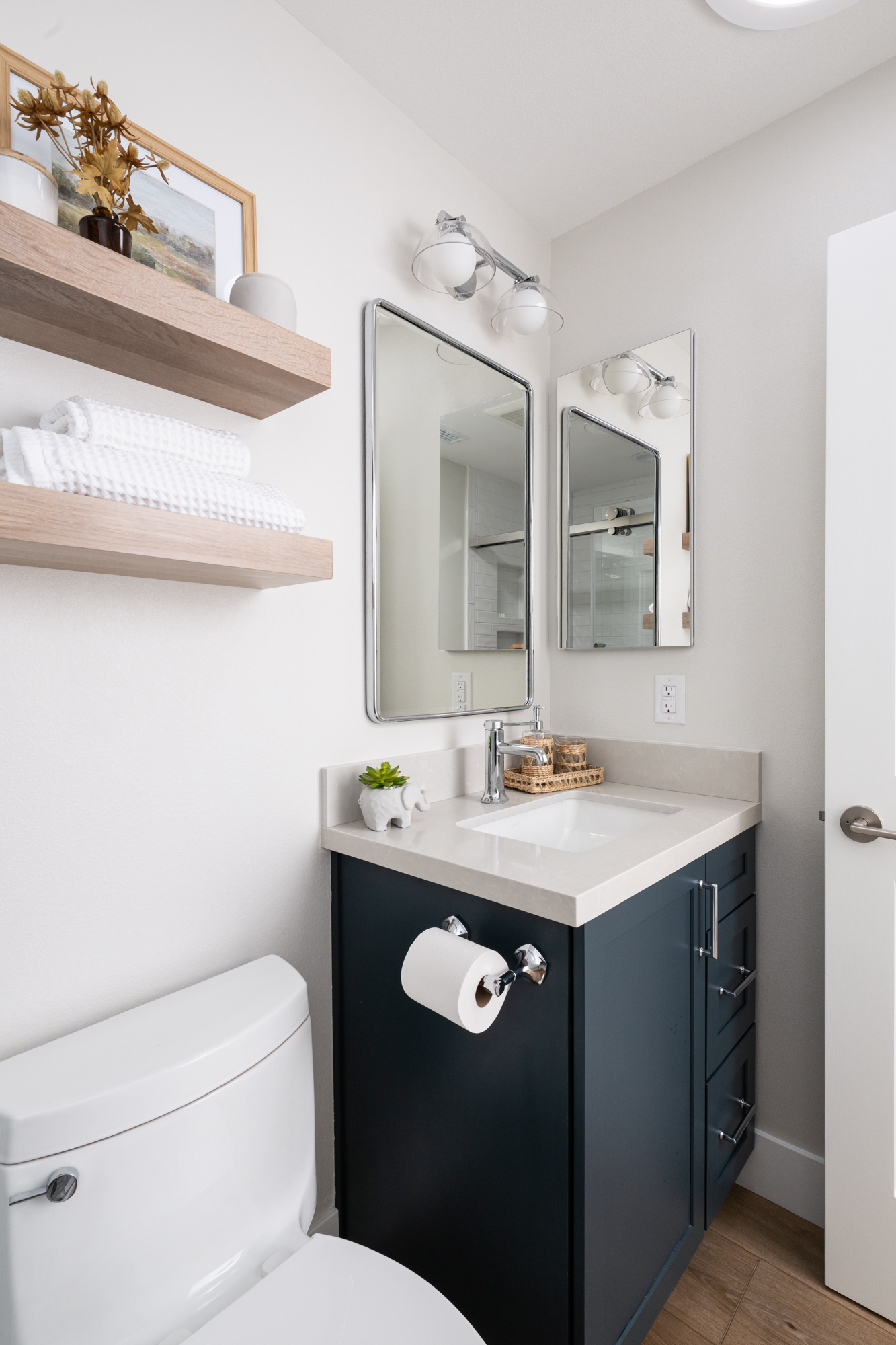 Silestone-quartz-countertops-in-polished-Desert-Silver-finish-white-undermount-sink-polished-chrome-single-handle-faucet