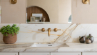 simple-rectangular-mirrors-and-sconces-sit-above-vanity