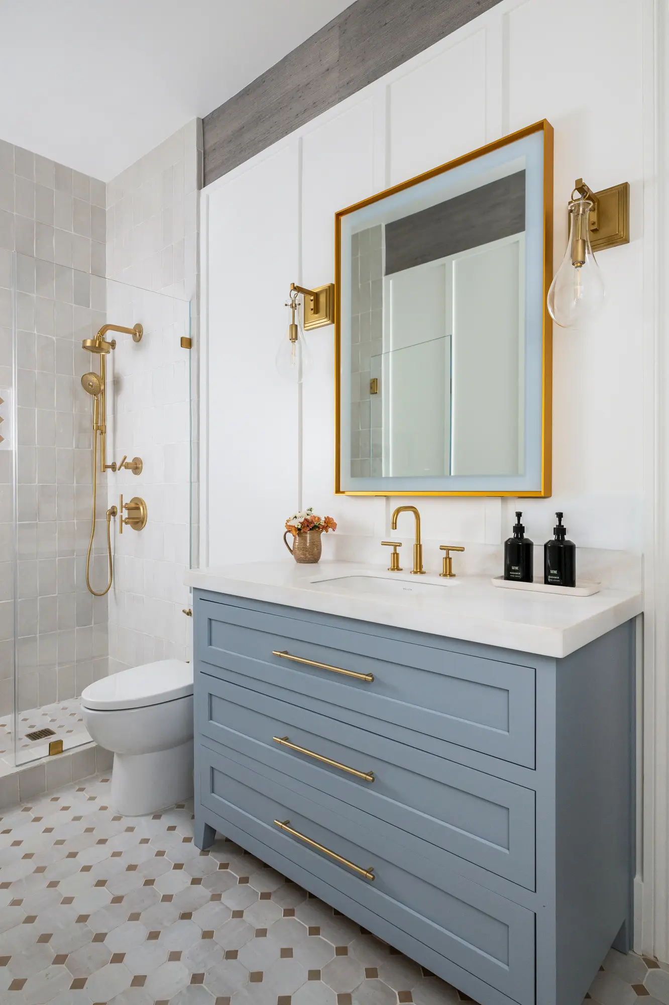 Statement lighting pieces are included in the 2025 bathroom remodeling trends