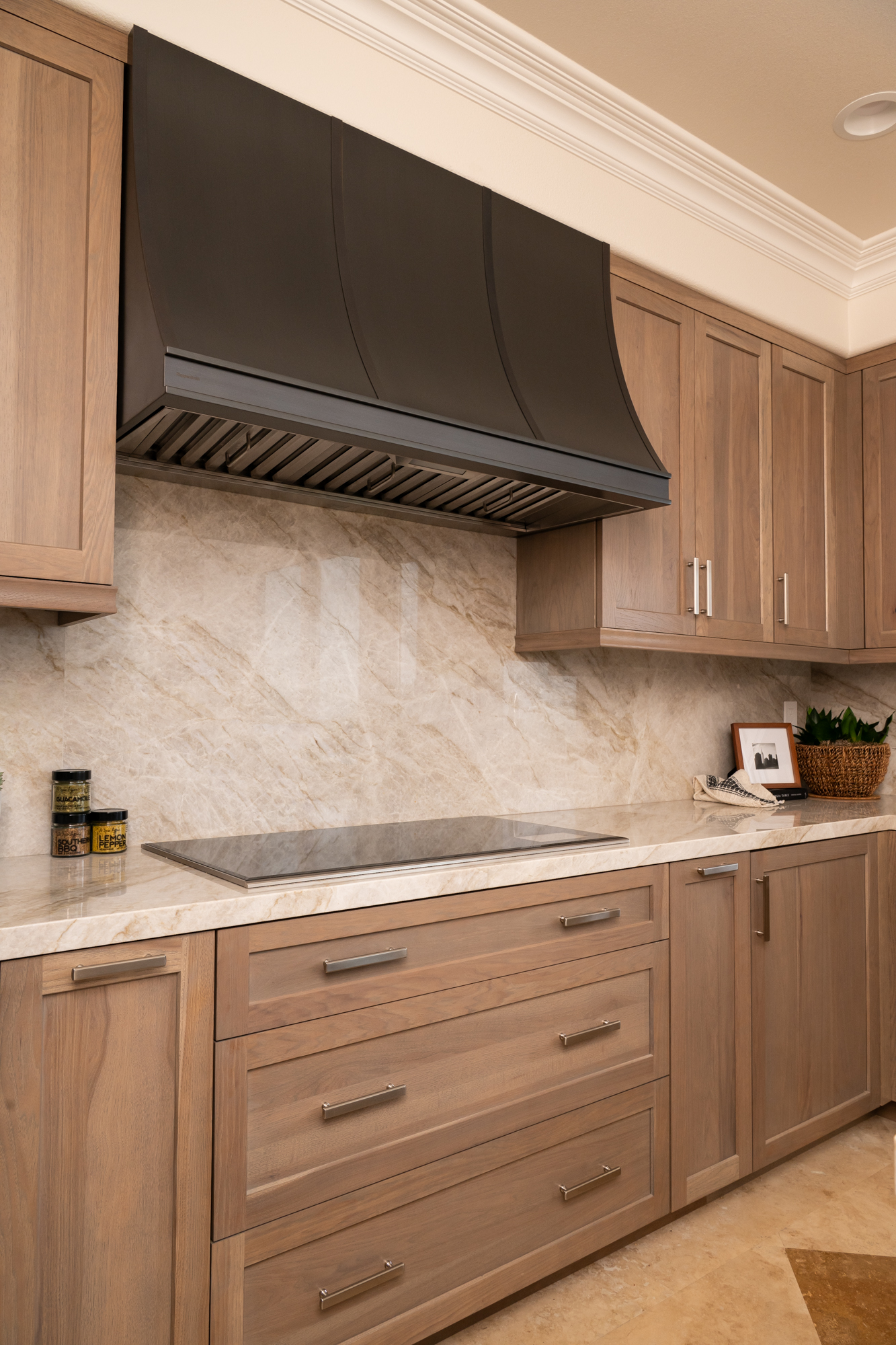 omega-full-access-cabinets-pecan-and-maple-wood-in-chinchilla-finish-with-custom-crown-moulding