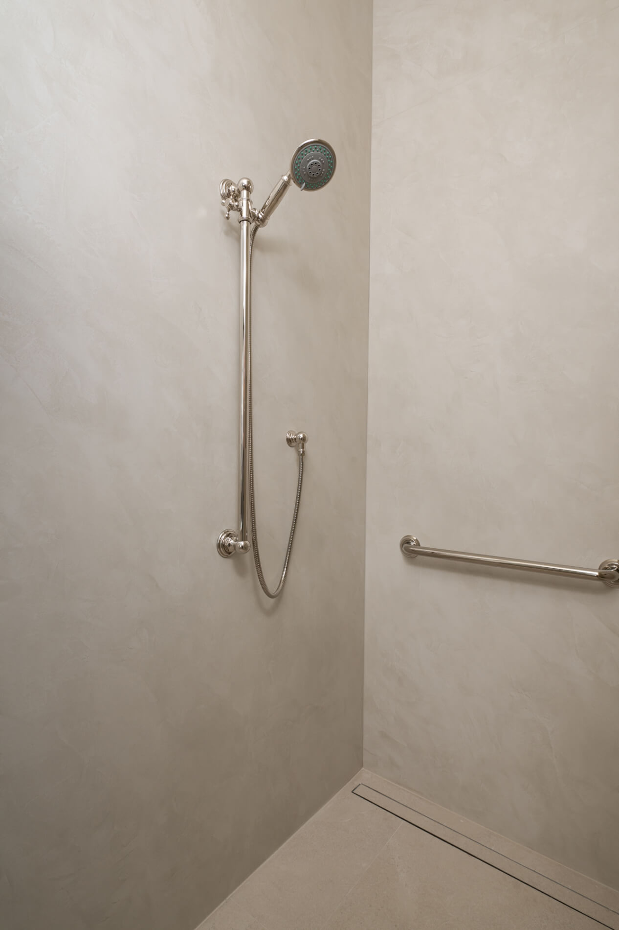 polished-nickel-multifunction-hand-shower-with-slide-bar-infinity-drain