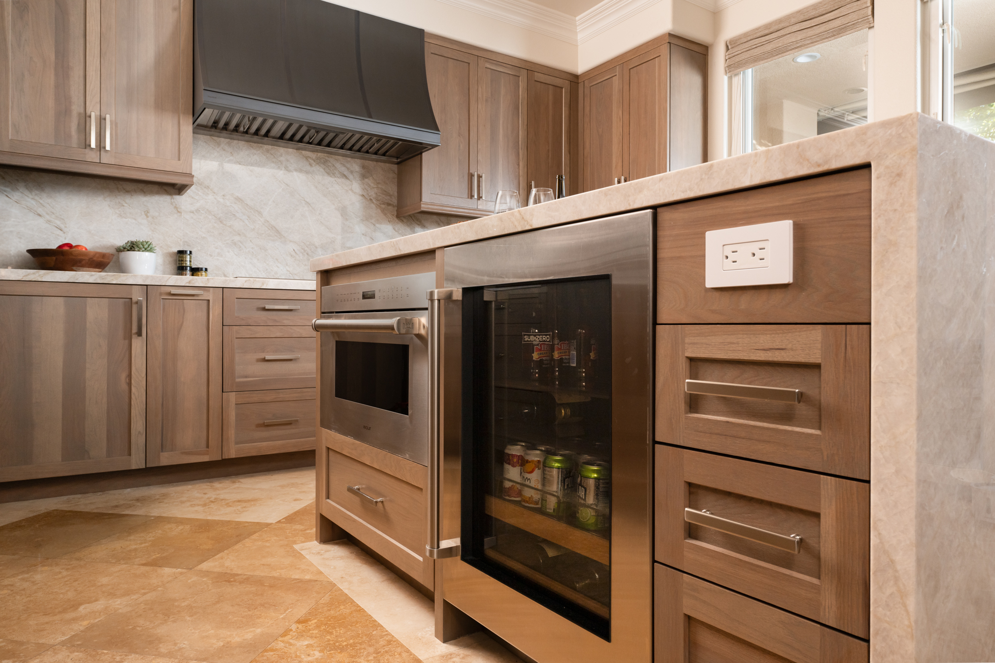 Beverage-fridge-and-steam-oven-built-into-island