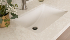 Silestone-quartz-countertops-backsplash-curb-cap-pony-wall-in-Polished-Lusso-finish