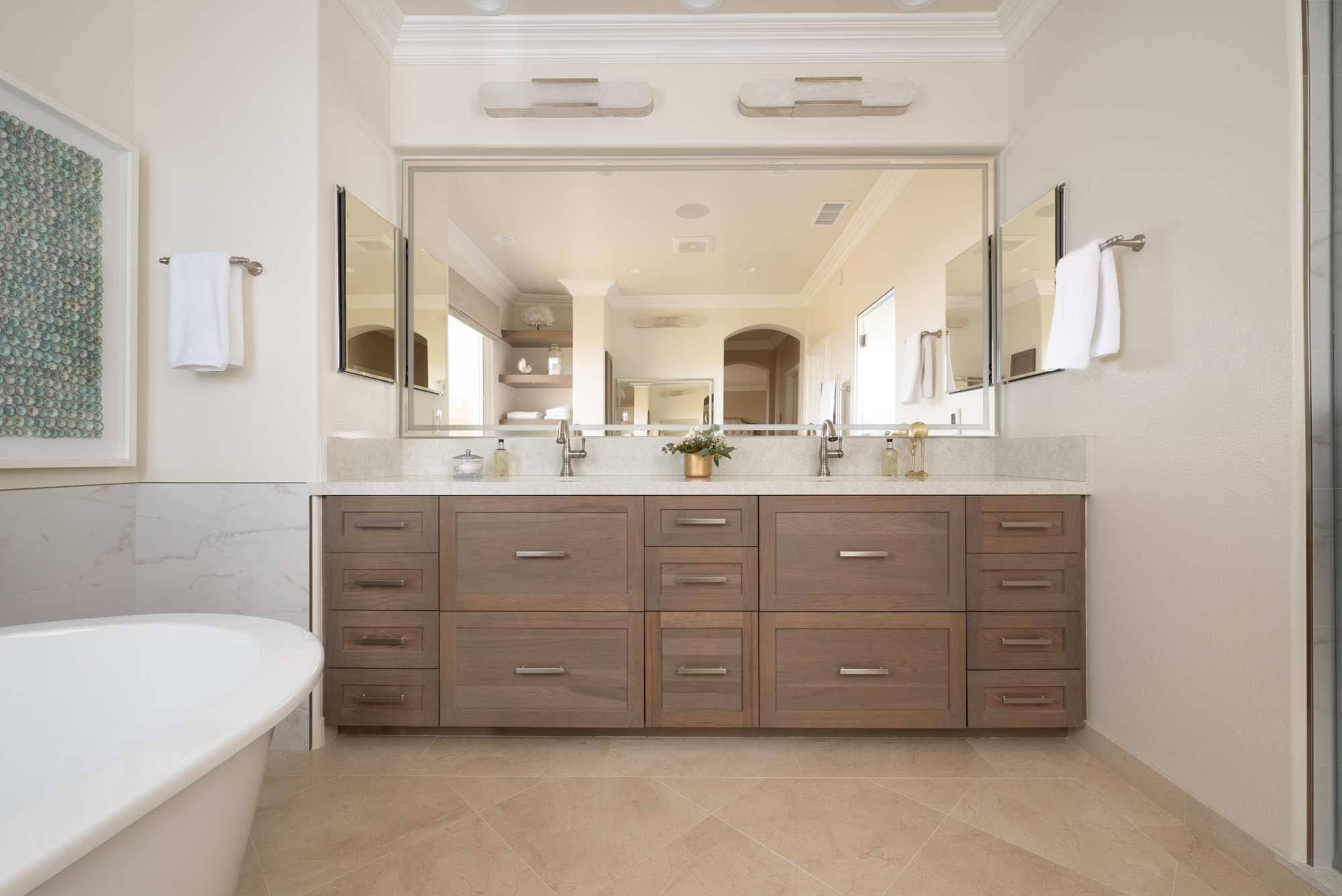 Crema-Marfil-Marble-tiles-in-diagonal-pattern-over-heated-flooring